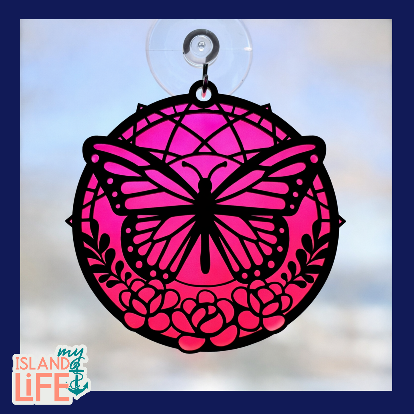 Pink butterfly design with floral patterns on a clear background, featuring 'my ISLAND life' logo.