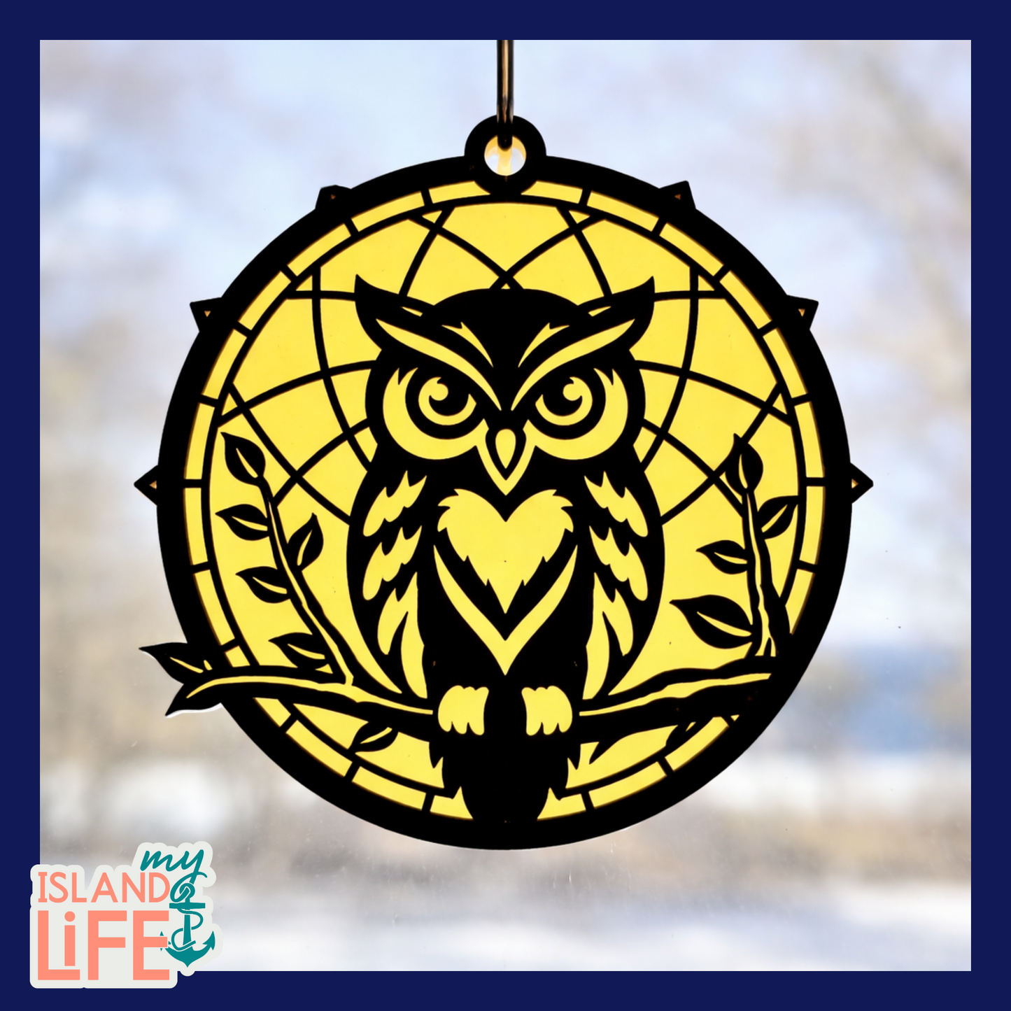 Decorative owl ornament with yellow background and 'My Island Life' logo.