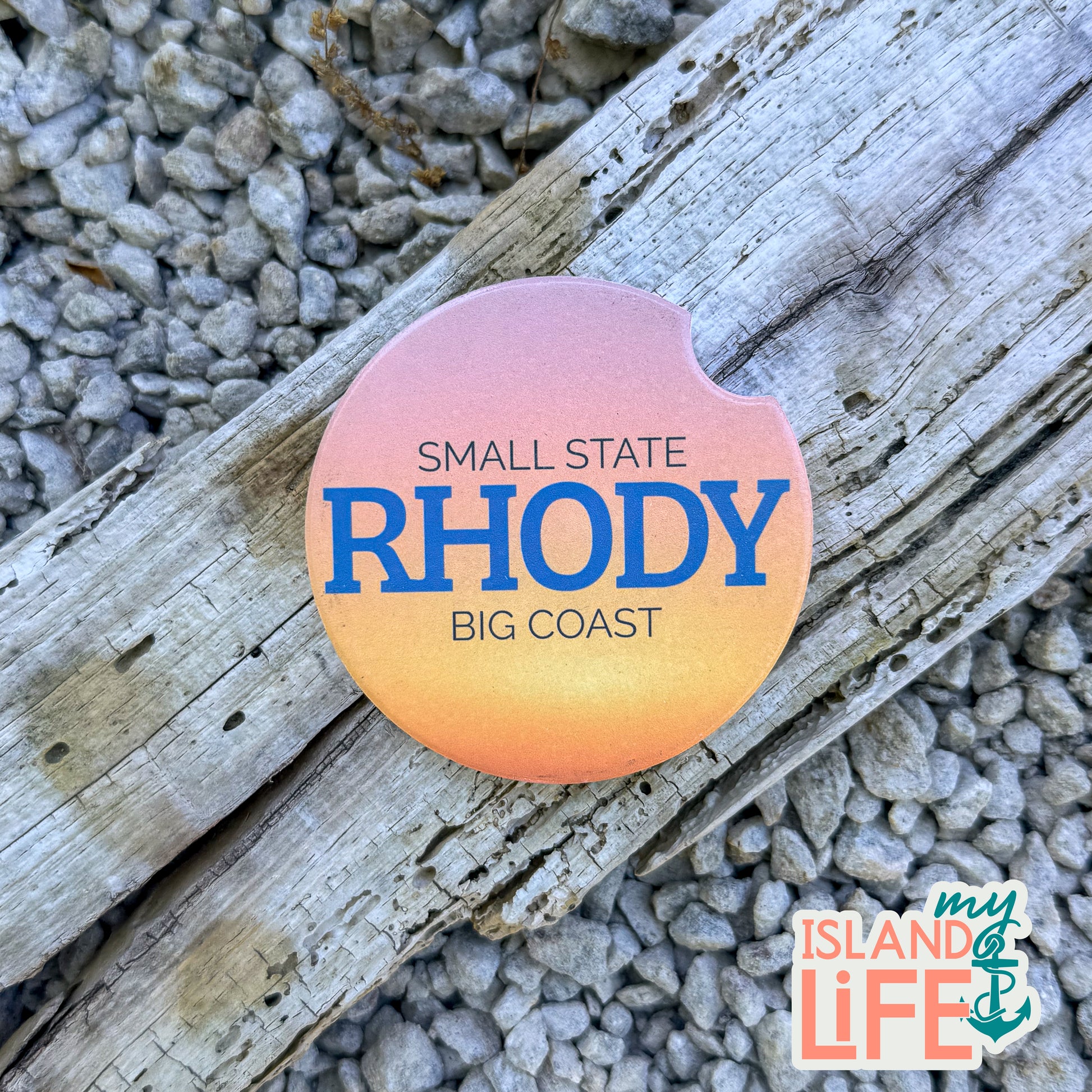 Car coaster with 'Small State RHODY Big Coast' text 
