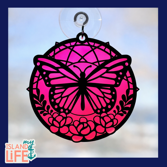 Pink butterfly design with floral patterns on a clear background, featuring 'my ISLAND life' logo.